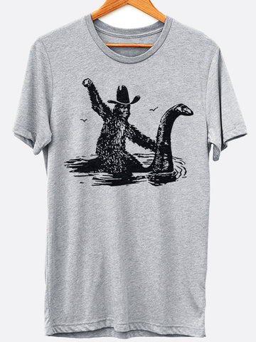 Bigfoot Riding Nessie Graphic Tee